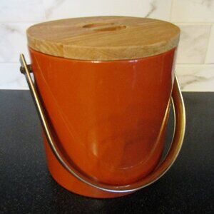 Vintage MCM burnt orange ice bucket with wood lid and brass handle